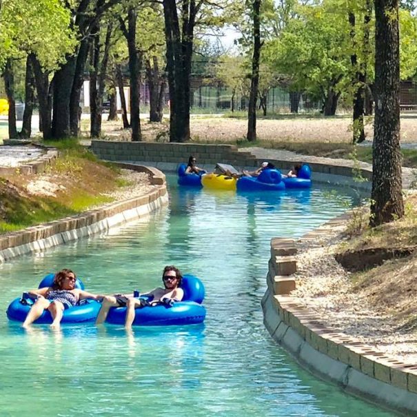 Friends on tubes in a lazy river