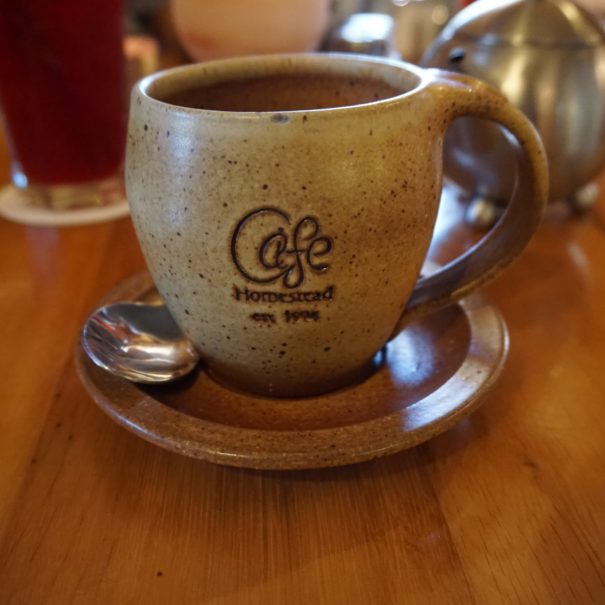 locally brewed coffee in an aesthetic mug