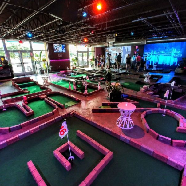 Mini gulf inside a sports and arcade bar